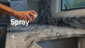 Stone Cleaner and Stone Protector demo video, showing the spray, clean and buffing of a white and black vein marble  countertop