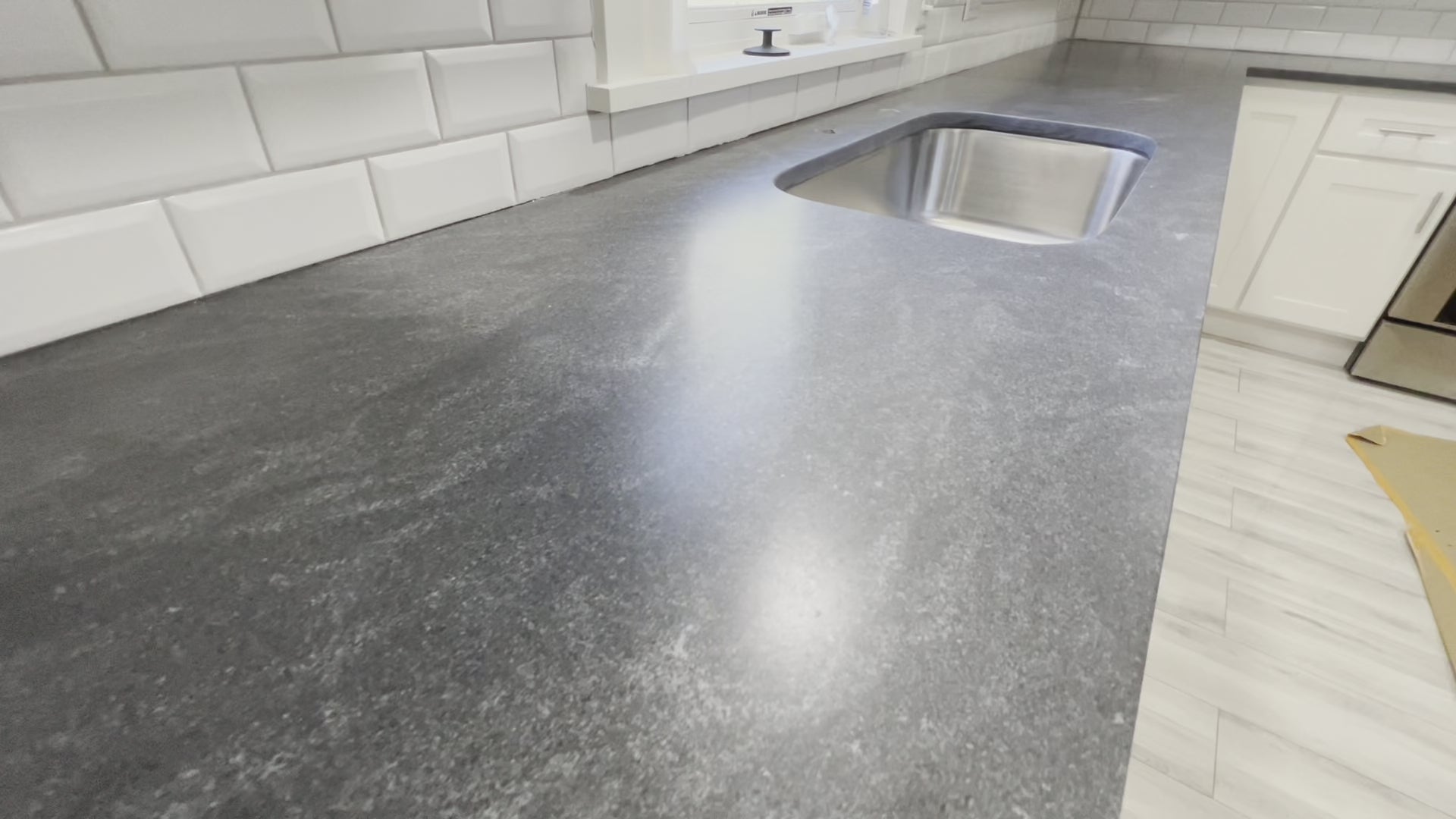 Video demonstrating the application process for the StainBlocka Sealer on a Jet Mist Honed  granite kitchen countertop