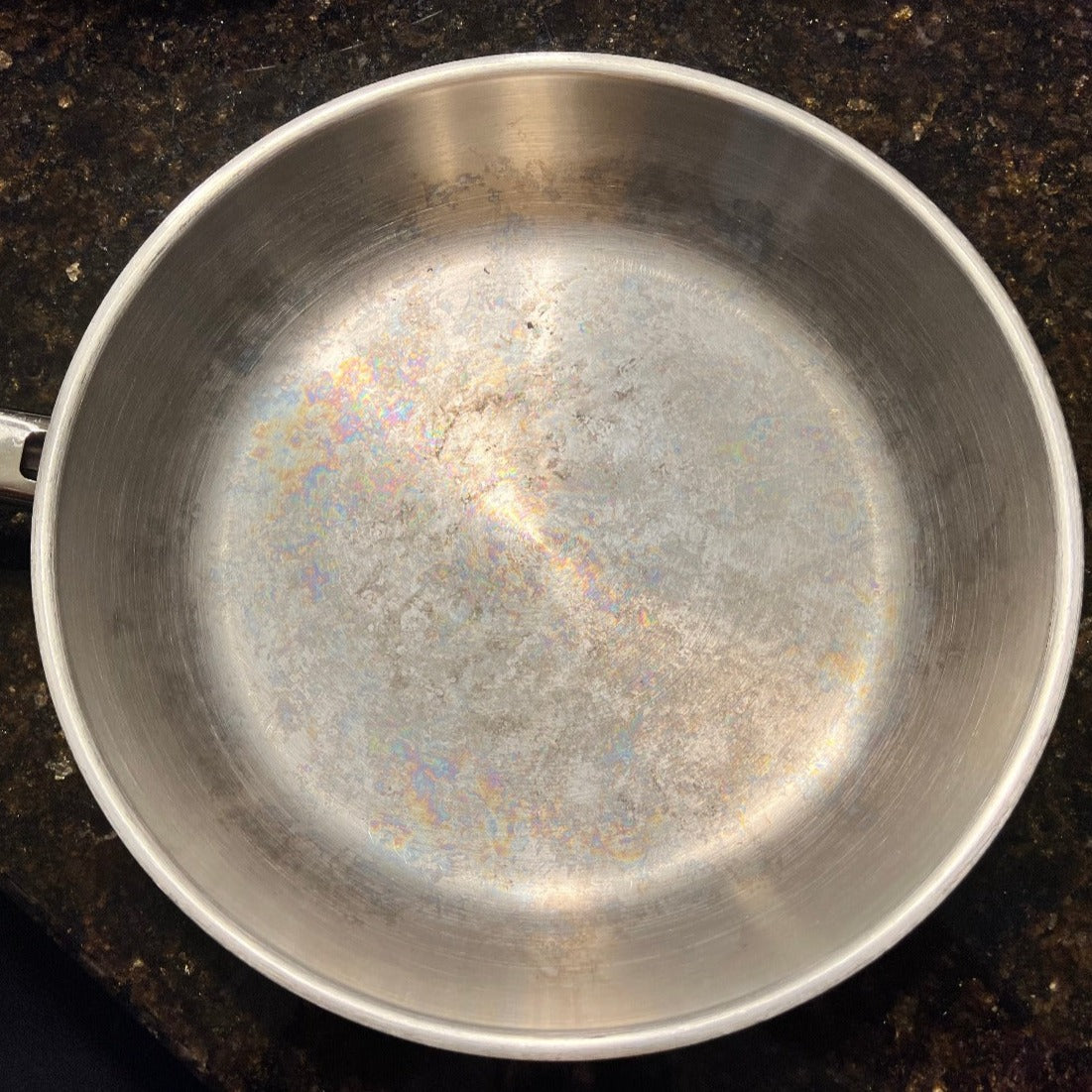 Stainless Steel pan showing staining from cooking